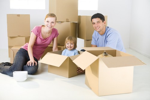 Worker wearing PPE while handling heavy items for a move
