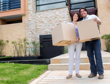 Family preparing for a house move in Wormwood Scrubs