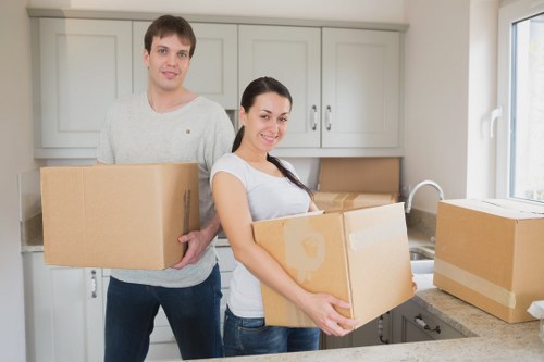 Business moving checklist and labelled office boxes ready for transport
